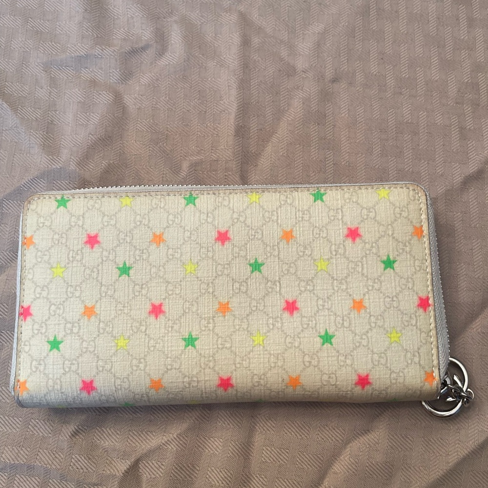 Make an offer!!  Authentic Gucci Multicolor Star Pattern Wallet Preloved